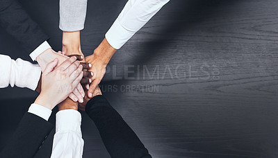Buy stock photo Business people, meeting and hands together above on mockup for teamwork, unity or collaboration. Top view of group touching hand for team agreement, motivation or support in trust on mock up space