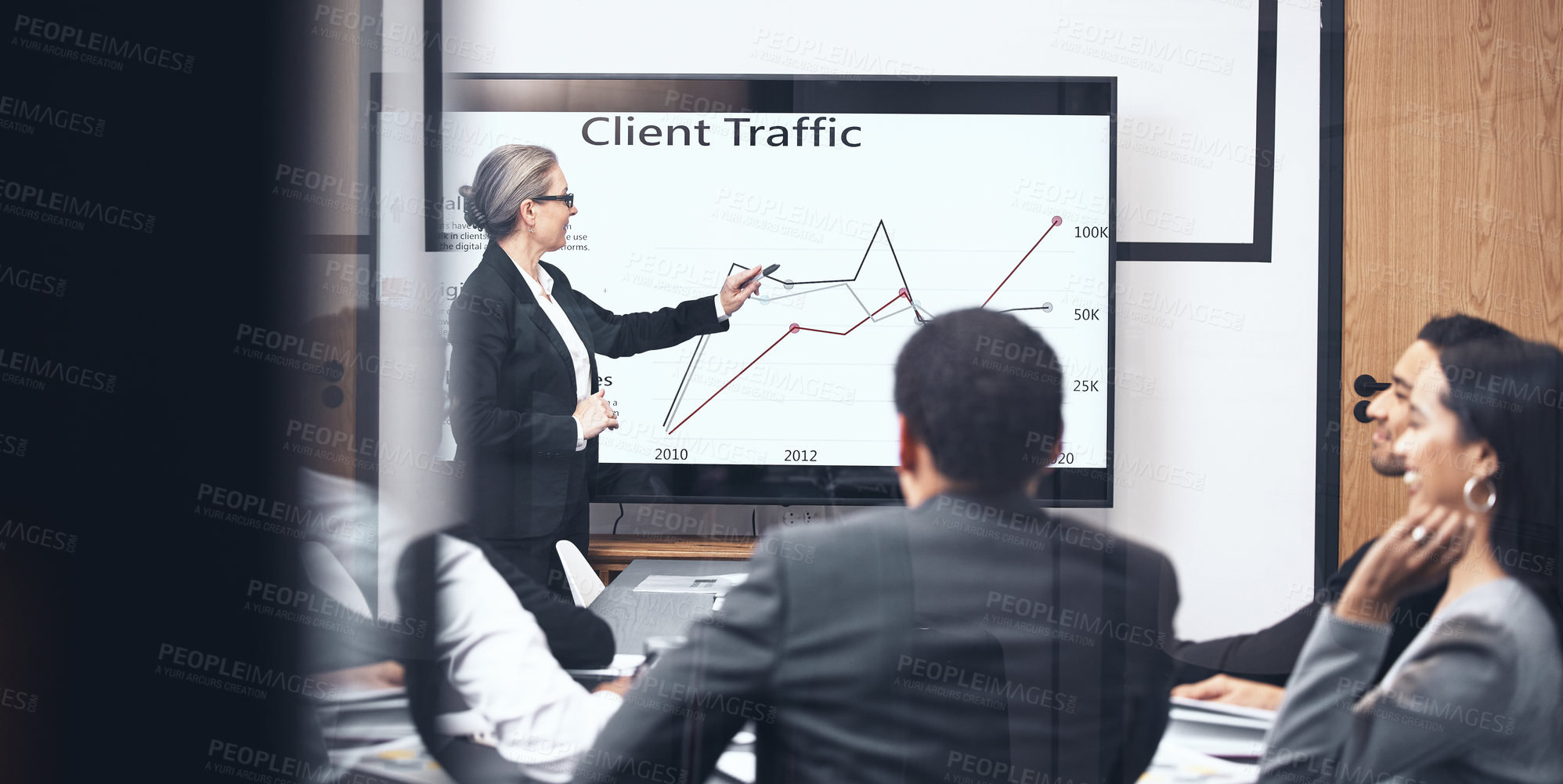 Buy stock photo Business woman, screen and team presentation for marketing strategy, meeting or coaching at office. Female person, CEO or coach training staff on technology display, graph or chart data at workplace
