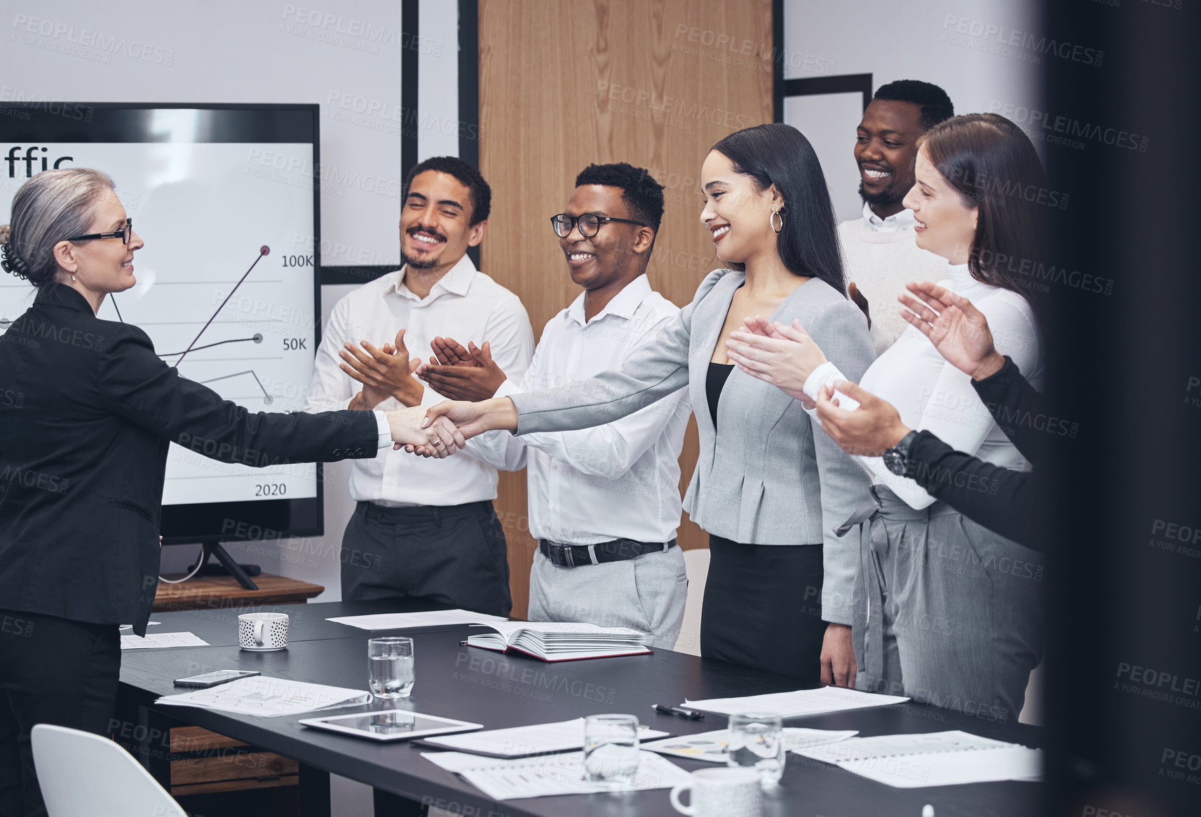 Buy stock photo Business people, handshake and applause in meeting for hiring, teamwork or partnership agreement at office. Group shaking hands or clapping in team recruiting success or corporate growth at workplace