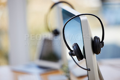Buy stock photo Shot of call center equipment in an empty office