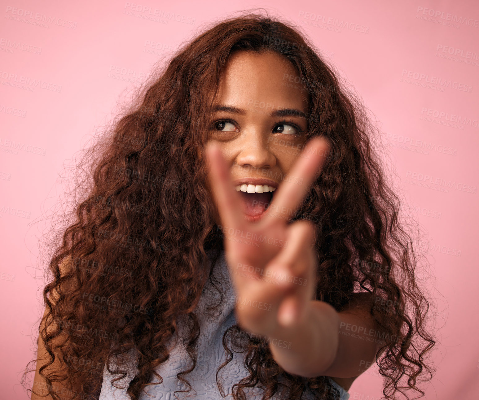 Buy stock photo Girl, happy and peace sign with hair in studio on pink background for treatment, growth or care. Female person, gen z and isolated with trendy or natural hairstyle, curls and soft for fresh texture