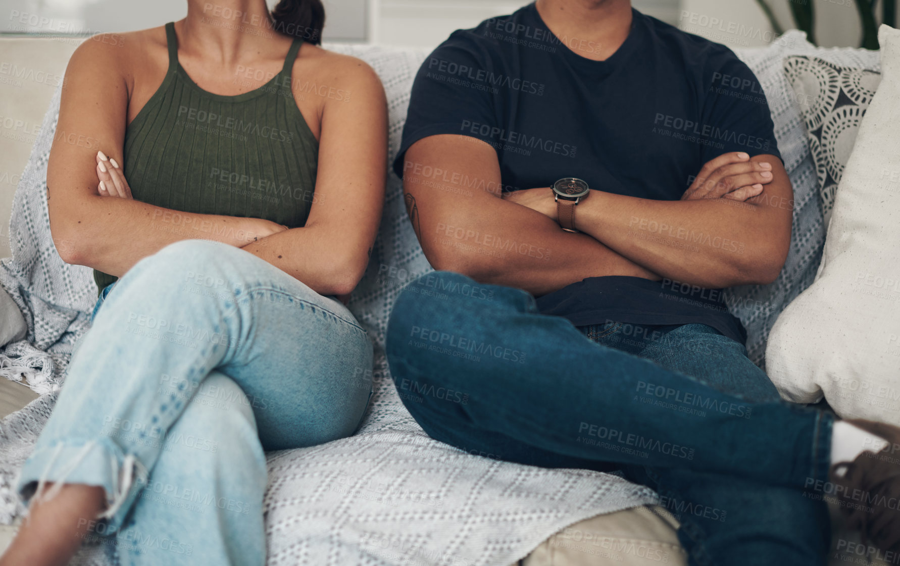Buy stock photo Divorce, fight and couple with arms crossed anger on a sofa frustrated by liar, cheating or breakup threat at home. Marriage, crisis and people in a living room with commitment doubt, argue or ignore