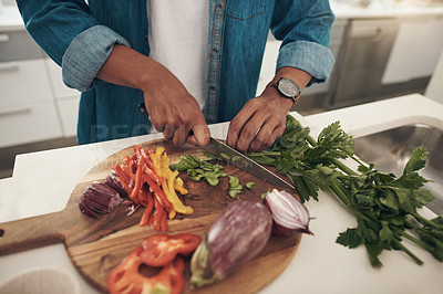 Buy stock photo Lunch, cooking and hands of man in kitchen with healthy food, fresh vegetables and salad in home. Diet, wellness and person at counter in apartment for meal prep, nutrition and knife on cutting board