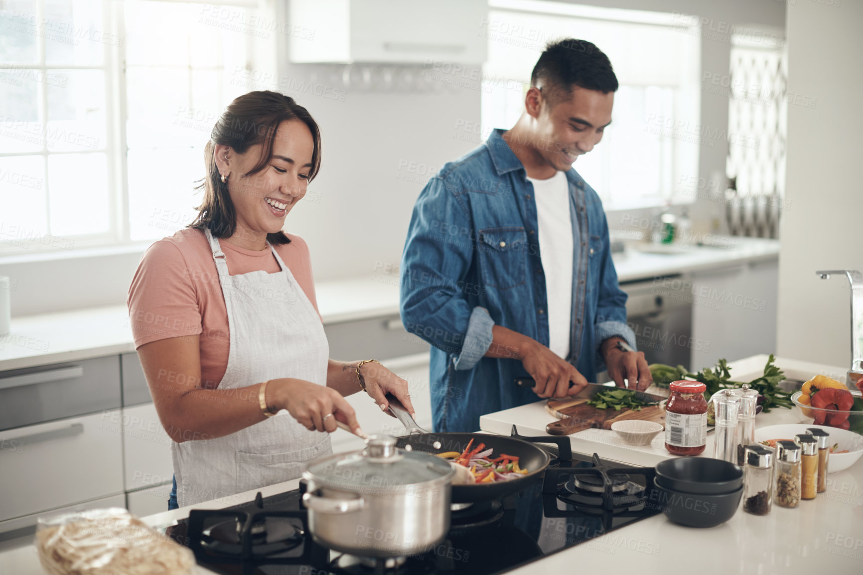 Buy stock photo Lunch, cooking and happy couple in kitchen together with healthy food, relationship and bonding in home. Diet, wellness and man helping woman in apartment with nutrition, care and meal prep with love