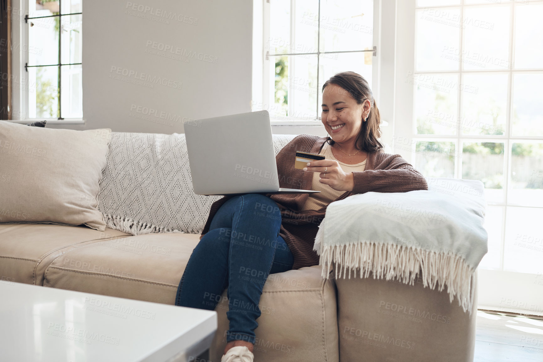 Buy stock photo Woman, laptop and credit card on couch to pay, finance and website for online shopping in home. Female person, ecommerce and code for transfer or purchase, sofa and app for banking or budget on tech