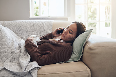 Buy stock photo Sick woman, tissue and phone call with flu for help, advice or recovery on living room sofa at home. Tired female person talking on mobile smartphone with bacteria, fever or influenza in fatigue