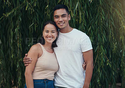 Buy stock photo Portrait, couple and hug for love in nature, marriage and embrace for man and wife. Support, partnership and happy for commitment for honeymoon to tropical Thailand, outdoors or bonding time together