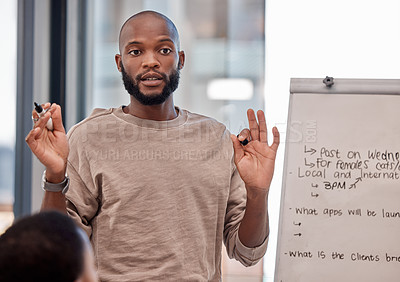 Buy stock photo Black man, coach and meeting with team for presentation, teaching or creative learning at office. African male person or presenter explaining on Flipchart for discussion, staff training or startup