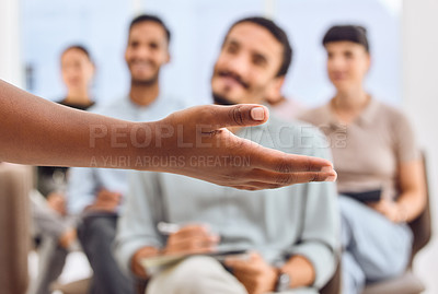 Buy stock photo Shot of an unrecognizable person delivering a presentation to a group of businesspeople
