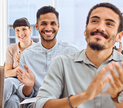 Buy stock photo Shot of a group of businesspeople clapping hands during a presentation