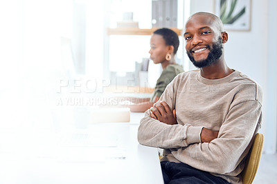 Buy stock photo Portrait of a confident businessman sitting at his desk