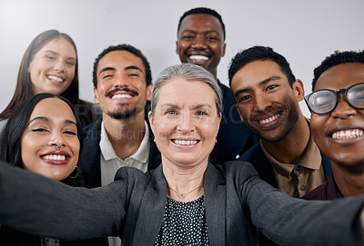 Buy stock photo Senior woman, business people and selfie in office, portrait and smile for diversity, solidarity or teamwork. Mature leader, group and happy for memory, profile picture or excited at financial agency
