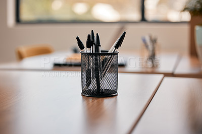 Buy stock photo Office, stationery and pen on desk for writing, notes and planning in creative workplace. Empty boardroom, interior background and closeup of equipment on table for business, working and career