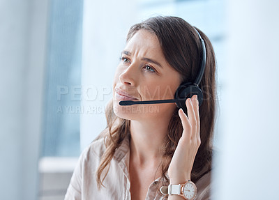 Buy stock photo Shot of a young businesswoman working in a call center