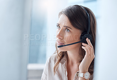 Buy stock photo Worry, call center and woman with telemarketing, customer service and stressed in a workplace. Female person, employee or agent with headphones, tech support and help desk with advice or mistake