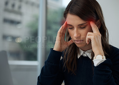 Buy stock photo Shot of a young businesswoman experiencing a headache while at work