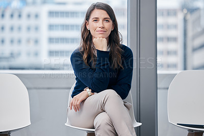 Buy stock photo Shot of a young businesswoman sitting in a waiting room