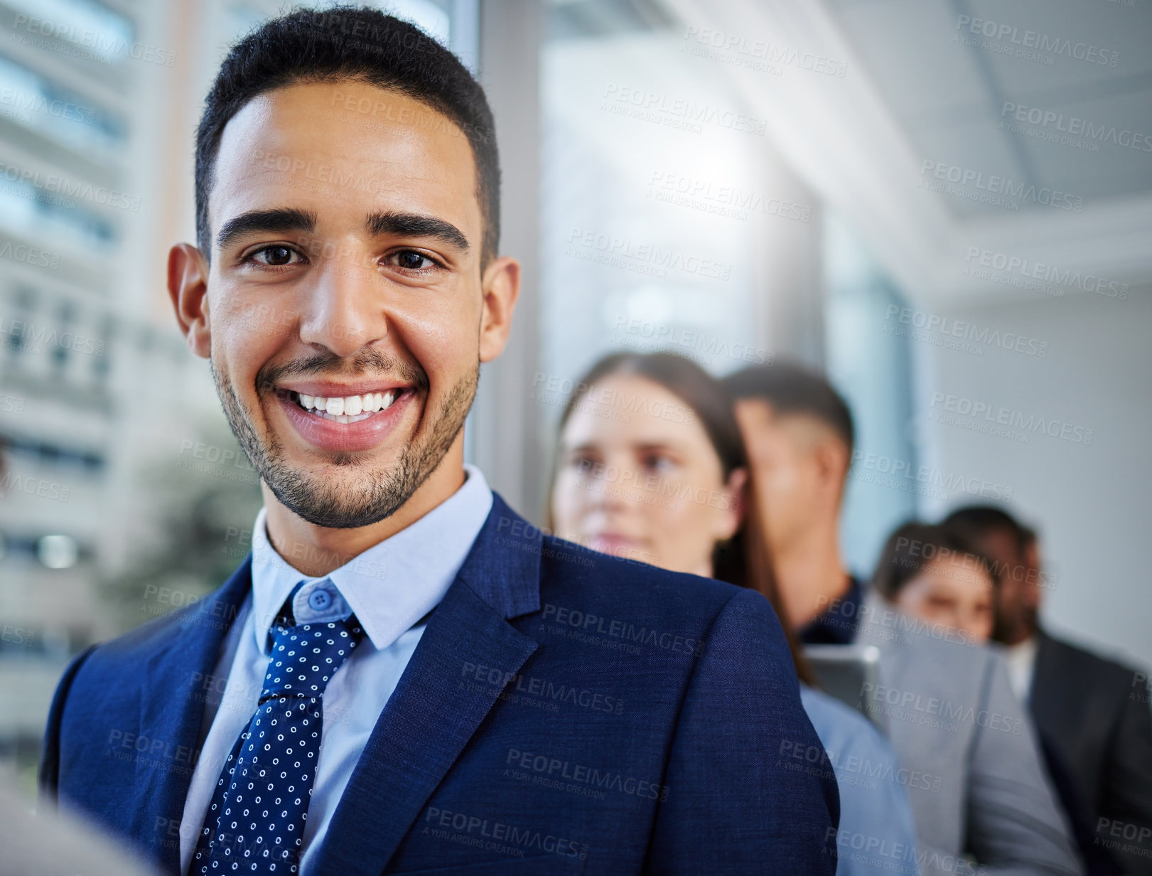 Buy stock photo Shot of a young businesswoman standing in line in a modern office