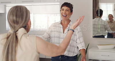 Buy stock photo Shot of a mother and daughter reuniting