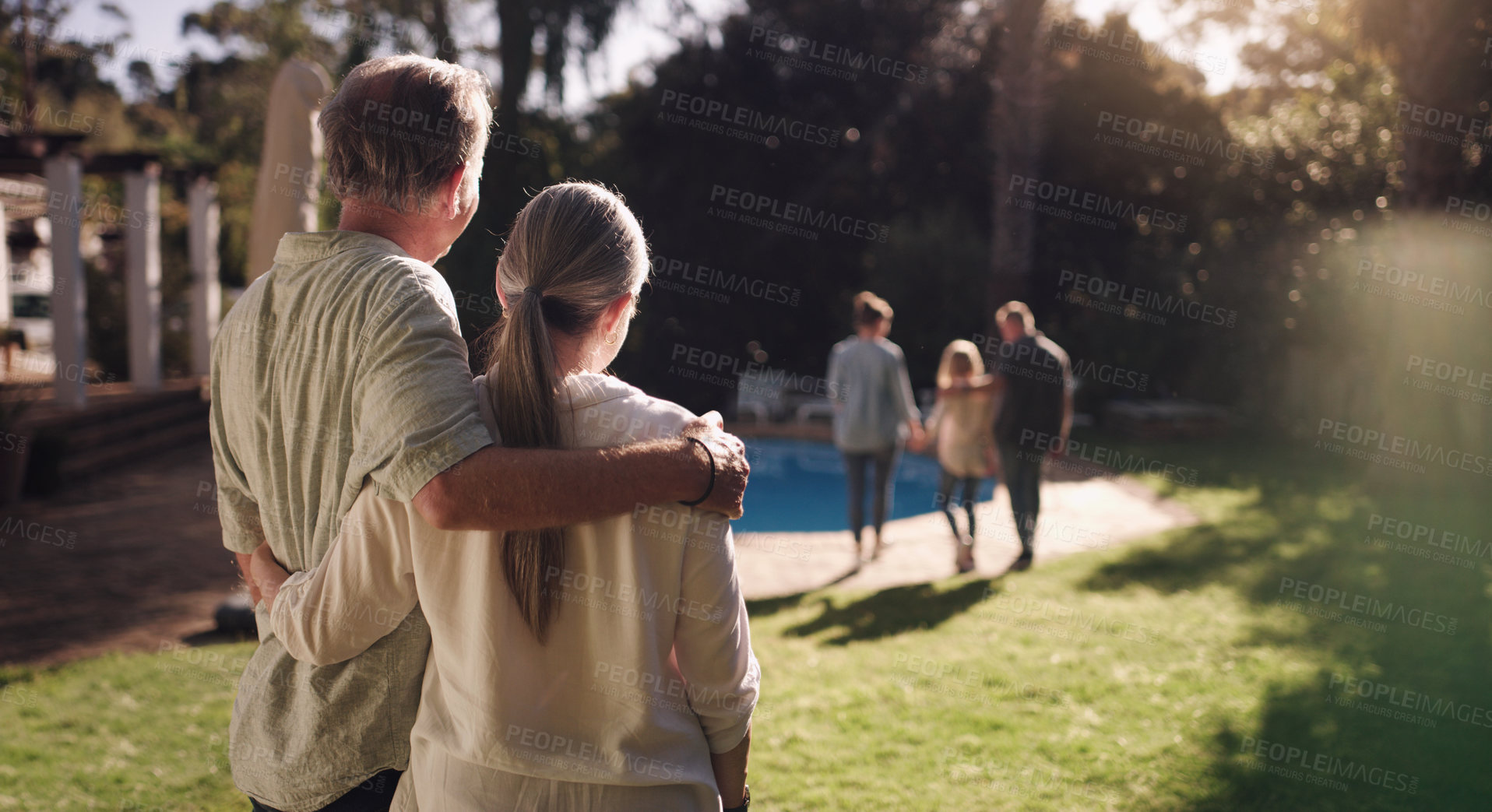 Buy stock photo Senior couple, garden and hug from behind with family for good memories, growth and goodbye together in backyard. Man, woman and back view in nature with embrace, pride and heartwarming at home