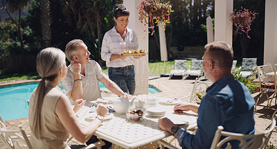 Buy stock photo Family, lunch or eating outdoor meal with smile for love, bonding and conversation on weekend break. Happy, people and food with coffee drinking in garden for relax talk or afternoon together