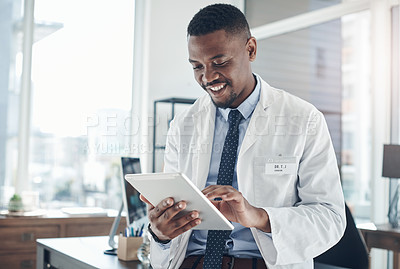 Buy stock photo Office, black man and doctor with tablet, smile and telehealth for clinic, serious and online for healthcare. Workplace, hospital and internet and technology for science, medical and research