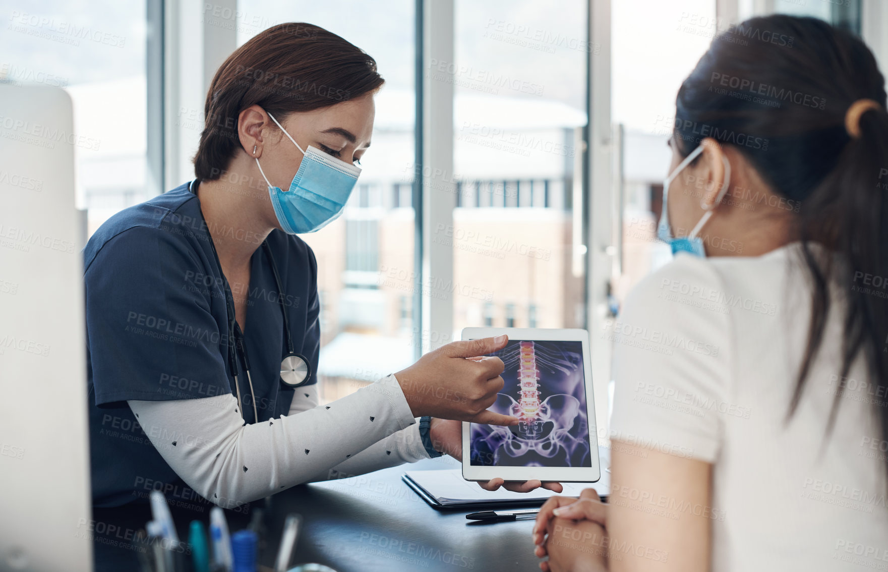 Buy stock photo Nurse, screen and tablet with x ray in hospital for bone tumor, infection and spine fracture results. Healthcare, medical worker and patient for consultation with digital diagnosis, face mask or talk