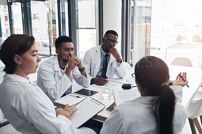 Buy stock photo Doctors, collaboration and planning for healthcare in office with tech, documents and research. Nurses, teamwork and group diversity in boardroom brainstorming strategy for immunotherapy development