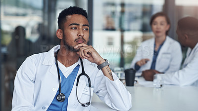 Buy stock photo Thinking, male doctor and hospital for healthcare, physician and medical health staff. Professional, expert and surgeon with stethoscope, man person or cardiologist for case research with colleagues