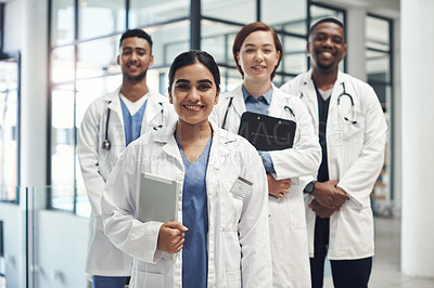 Buy stock photo Doctors, smile and portrait in hospital standing with clipboard for health care, wellness and solidarity. Clinic, surgeons or physicians together for medical advice, teamwork or collaboration
