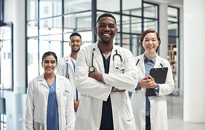 Buy stock photo Diversity, doctors and portrait with confidence in hospital for collaboration with healthcare, expert help and leader. Man, global staff and teamwork in clinic for pride, medical job and smile
