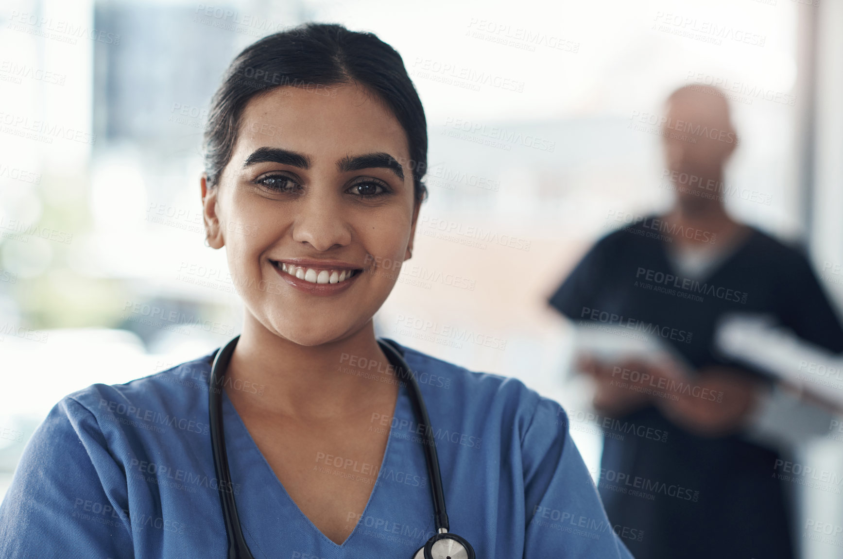 Buy stock photo Portrait, nurse and happy woman in hospital for healthcare career, wellness and service in Brazil. Face, smile and young medical professional doctor, surgeon and expert employee working in clinic