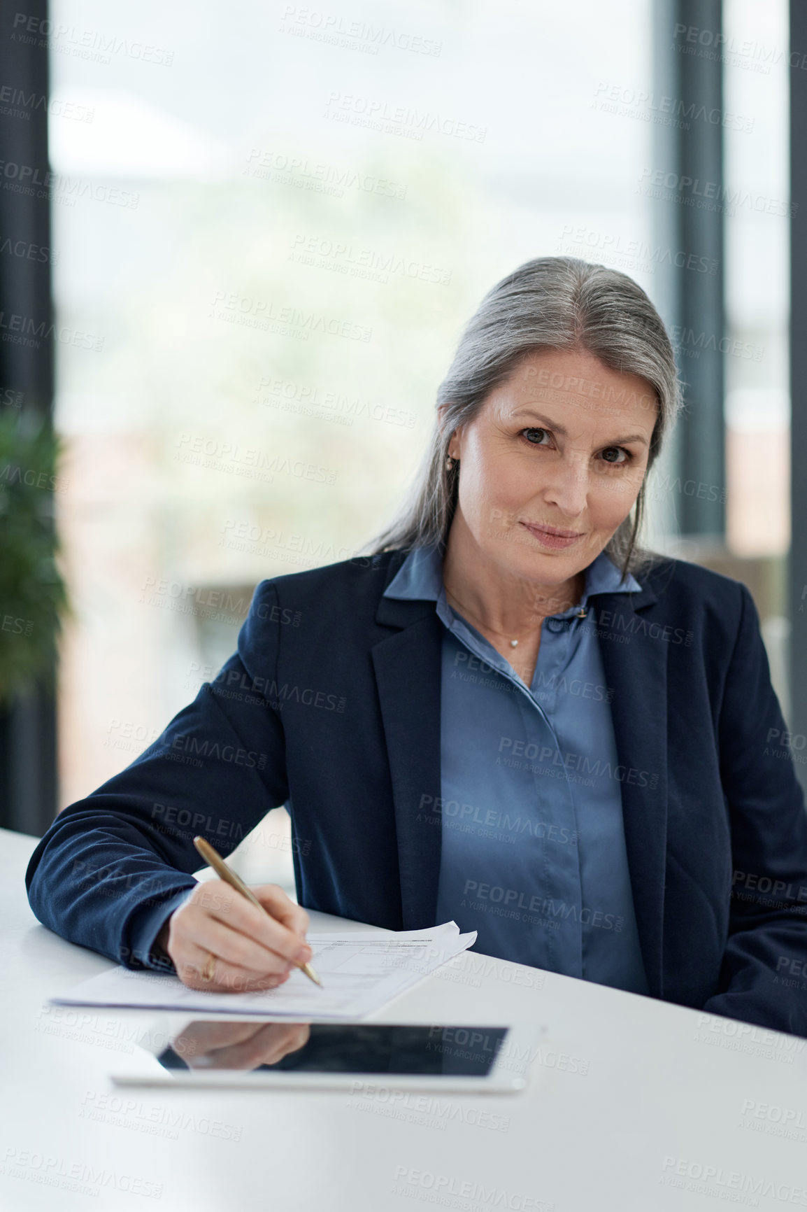 Buy stock photo Mature, business woman and portrait with documents at office for finance, contract or legal agreement. Female person, CEO or financial executive writing or signature with smile for company policy
