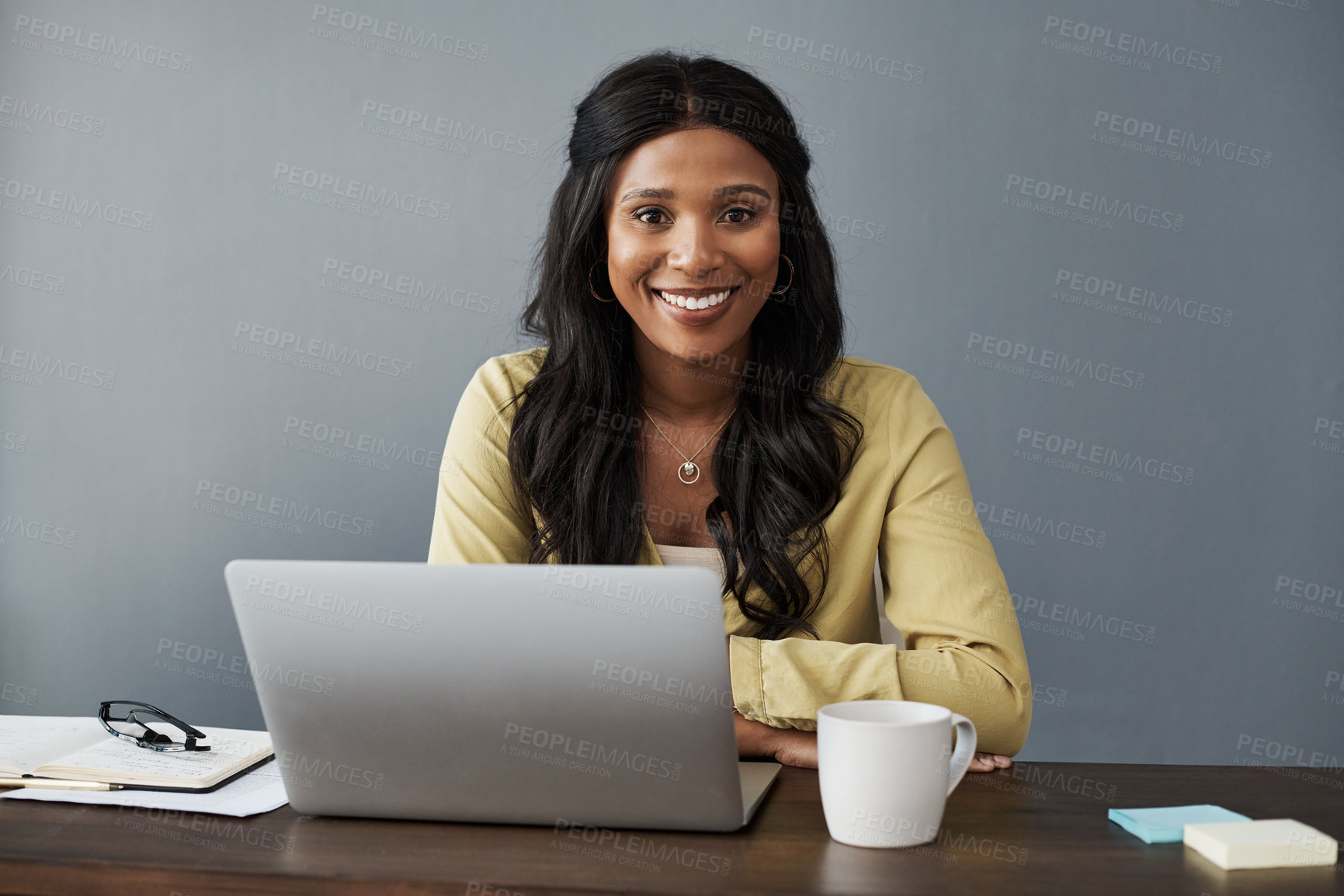 Buy stock photo Shot of a young businesswoman working from home