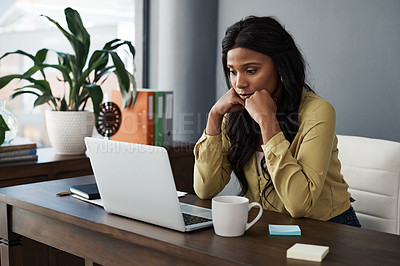 Buy stock photo Shot of a young businesswoman working from home