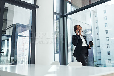 Buy stock photo Happy woman, office and business discussion with phone call by window for proposal or friendly chat. Young female person or financial advisor talking on mobile smartphone with coffee for conversation