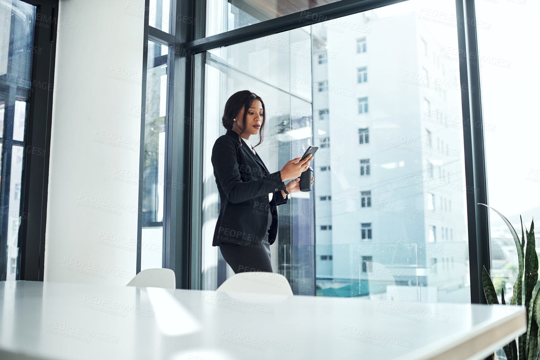 Buy stock photo Watch, video and woman with phone in office with social media, post or scroll on coffee break. Employee, reading and relax with online website, chat or communication in workplace with app or tech