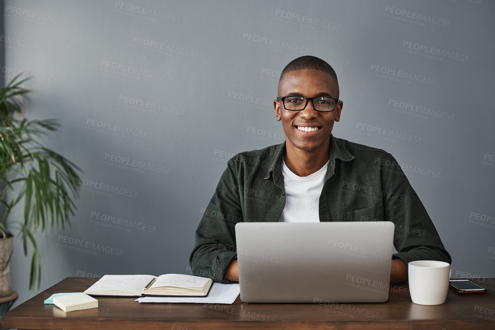 Buy stock photo Business, laptop and portrait of happy black man in office for software, research and information in creative startup. Face, computer and web developer in glasses or African entrepreneur in Kenya