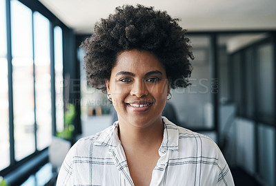 Buy stock photo Shot of a young businesswoman smiling in an office