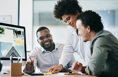 Buy stock photo Shot of a group of young businesspeople having a discussion in an office