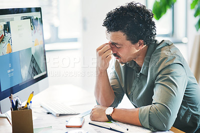 Buy stock photo Shot of a young businessman in pain in an office