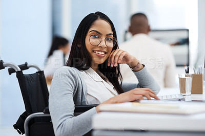 Buy stock photo Cropped portrait of an attractive young businesswoman working at her desk in the office