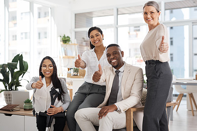 Buy stock photo Cropped portrait of a group of diverse businesspeople giving you thumbs up while gathered in their office