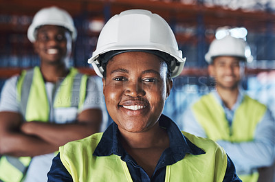 Buy stock photo Shot of a group of contractors standing in the warehouse together