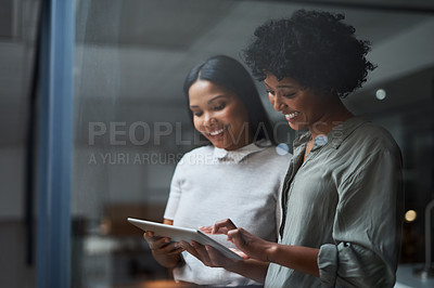 Buy stock photo Shot of Two businesspeople working in a modern office