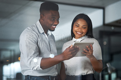 Buy stock photo Shot of Two businesspeople working in a modern office