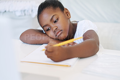 Buy stock photo Black child, book and writing notes in home, homework and knowledge for education at table. Female person, notebook and student for learning, planning and drawing for creativity assignment or test