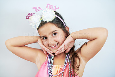 Buy stock photo Birthday, girl and portrait in house with excited for celebration with party, happy and smile. Head band, child and special day of birth with facial expression on white background for memories.