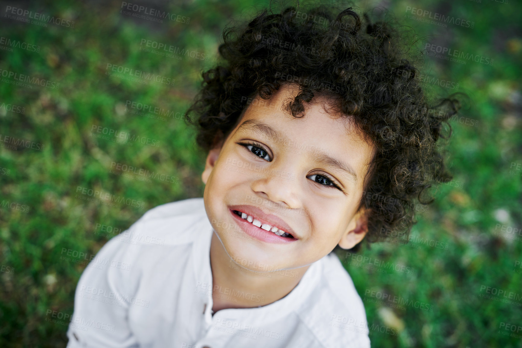 Buy stock photo Happy, kid and portrait in garden with smile in backyard on summer holiday on home lawn. Grass, above and boy from Dominican Republic on vacation with youth development and confidence of toddler