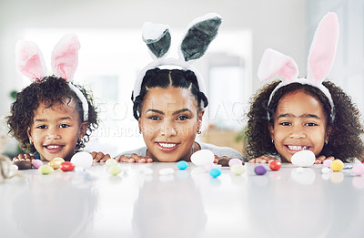 Buy stock photo Shot of a mother spending time with her daughters at home